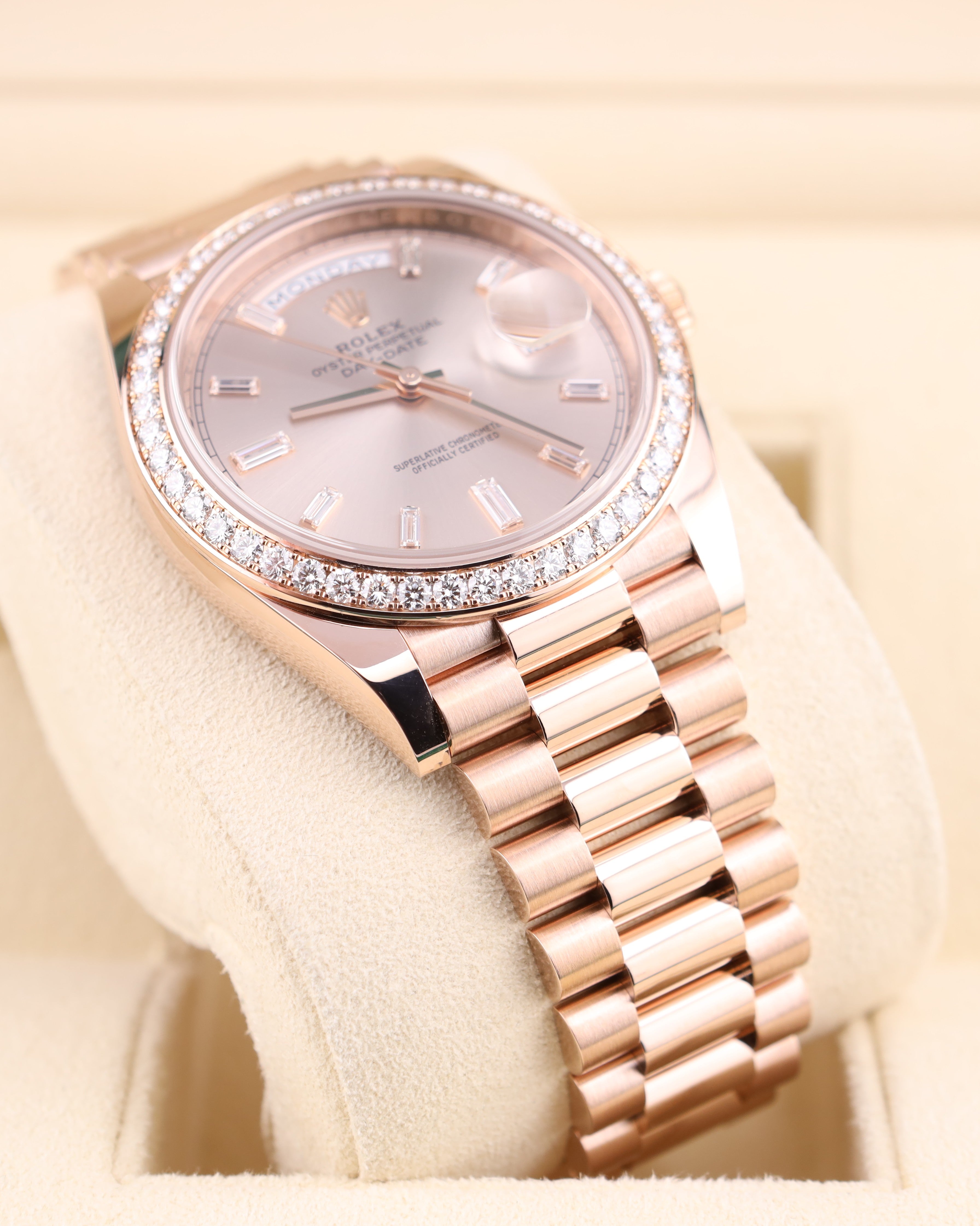 Rolex Day-Date 40 Baguette Sundust Pink Dial Diamond Bezel 228345RBR