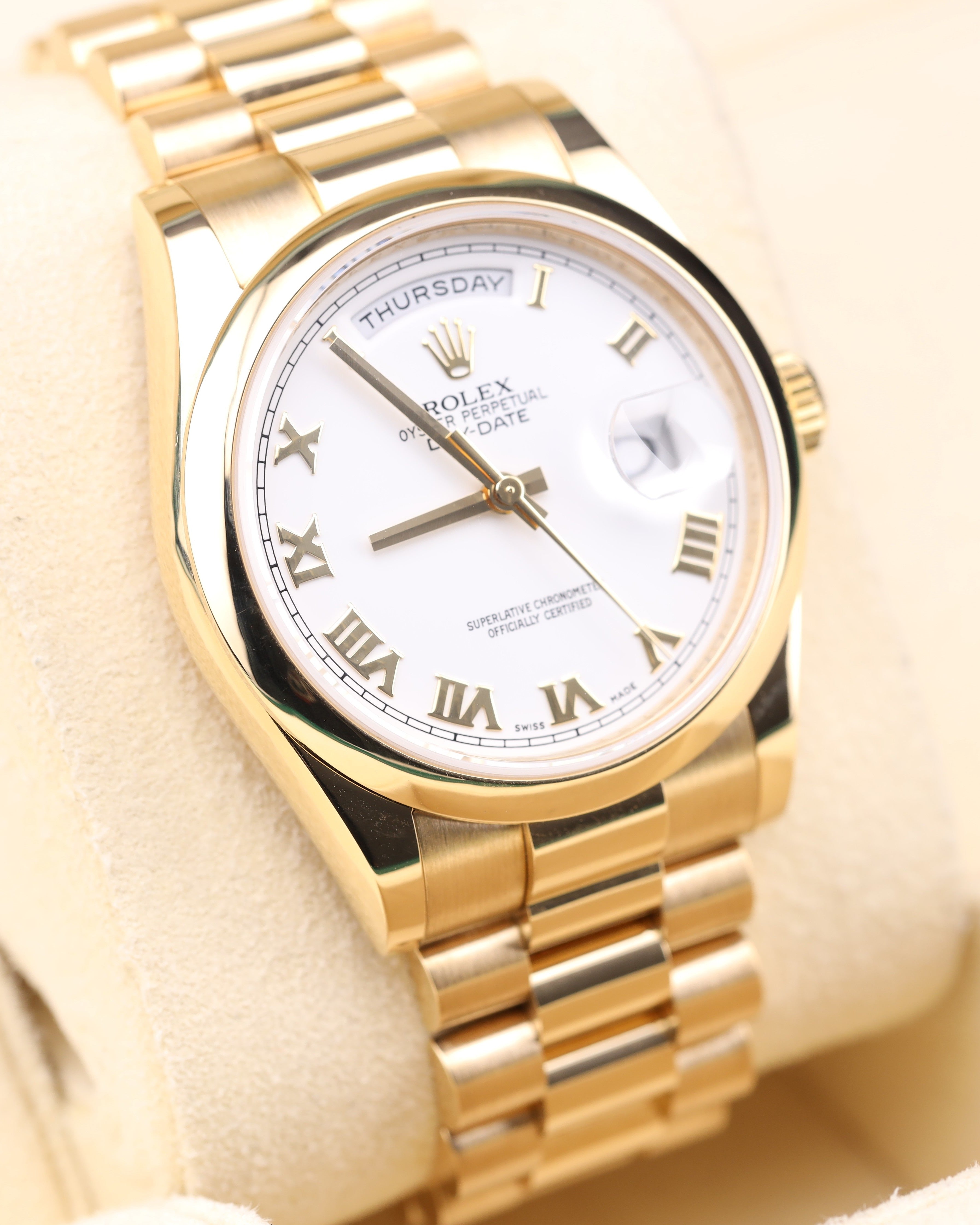 Rolex Day-Date 36 White Roman Dial Yellow Gold President Smooth Bezel 118208